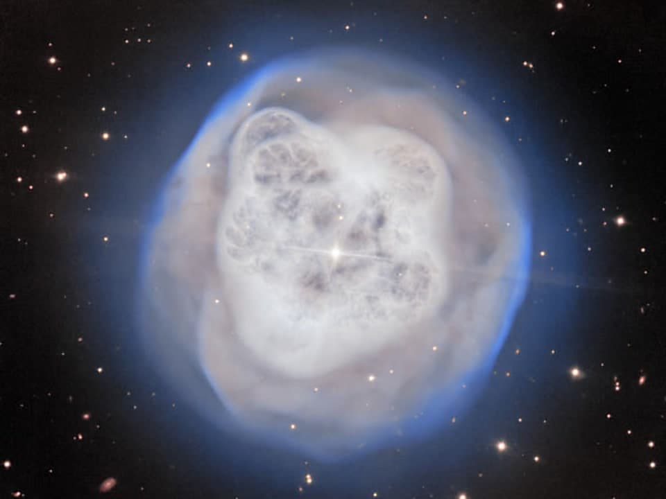 High‑resolution Gemini North image of the Crystal Ball Nebula revealing intricate filaments and bright knots.